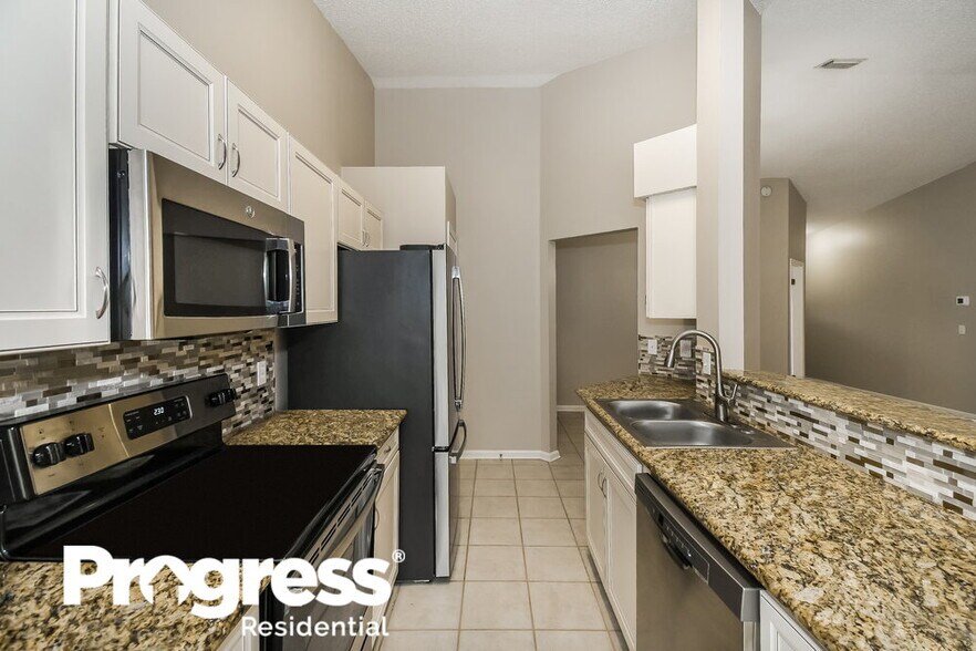 Building Photo - 8026 Fleur De Lis Dr