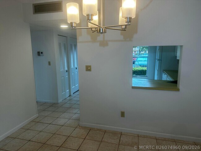 Building Photo - 6091 NW 61st Ave