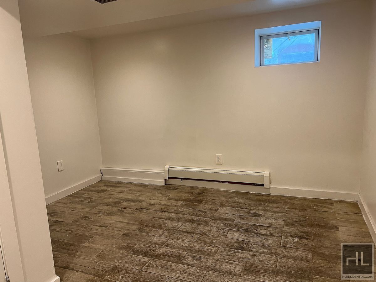 Building Photo - 2BR 1BA Lower Level All Utilities Included w/ Laundry Beside Highland Park