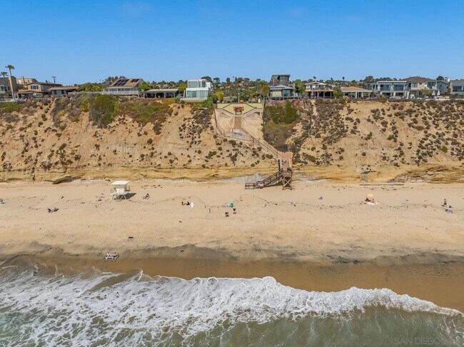 Building Photo - THE BEACH IS YOUR BACKYARD! Light & Bright...