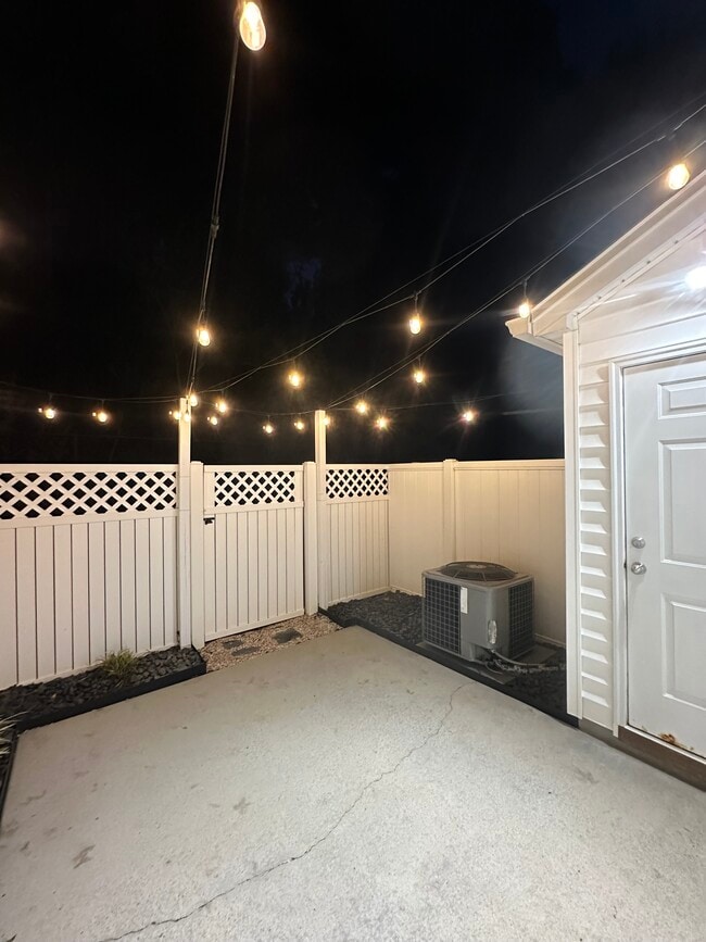 Bistro lights in back patio - 1215 Green Oaks Ln
