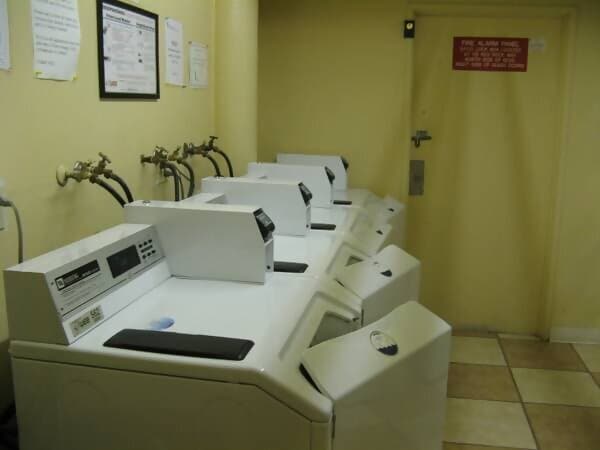 Laundry with “Wash” card machine - 15 Red Rock Way