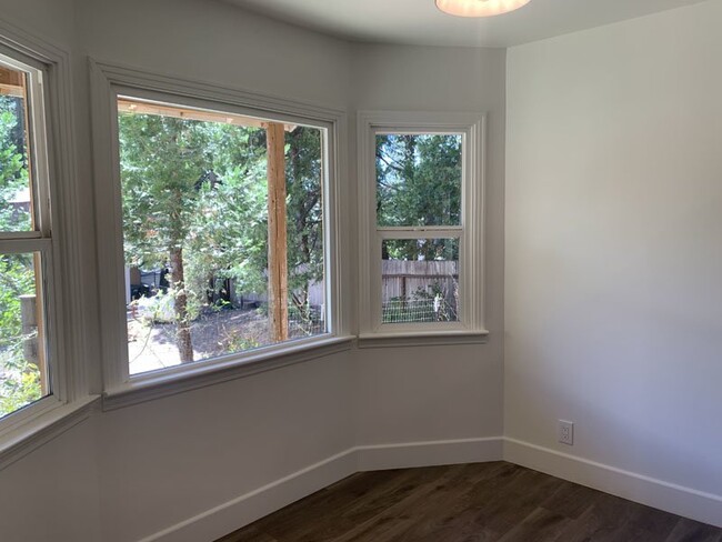 Building Photo - Recently remodeled home located behind sto...