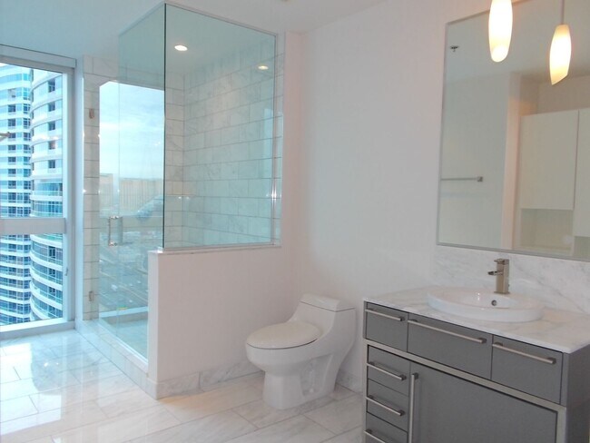 Building Photo - Experience elevated high-rise living at The Martin.