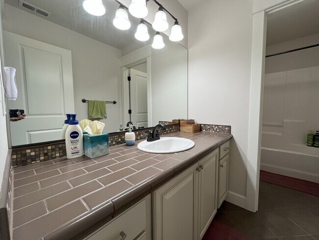 Building Photo - Spacious Corner-Lot Home with Three Levels...