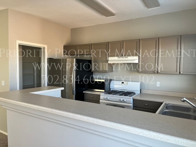 Building Photo - ~IMMACULATE TOWNHOME! Gated Access! 2 Primary Bedrooms! 1 Car Attached Garage! DO NOT MISS THIS!