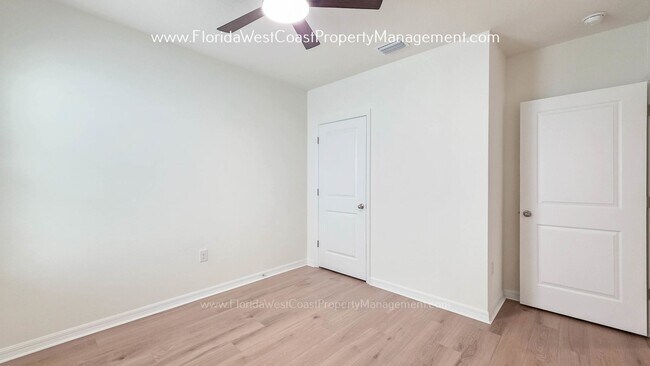 Building Photo - MOVE IN READY ! 4 BEDROOM/2 BATH! TILE- LVP THROUGHOUT! LAWN MOWING INCLUDED!