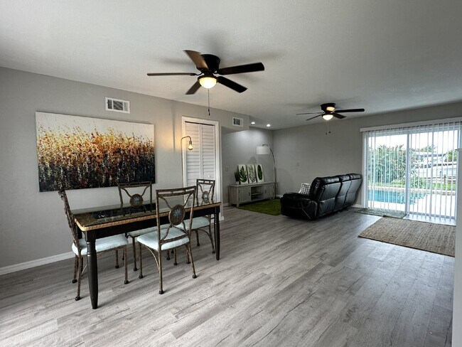 Building Photo - "Elegant 3-Bed Waterfront pool Home"