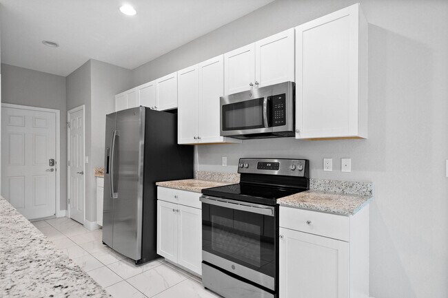 Building Photo - 1597 NW Cataluna Cir