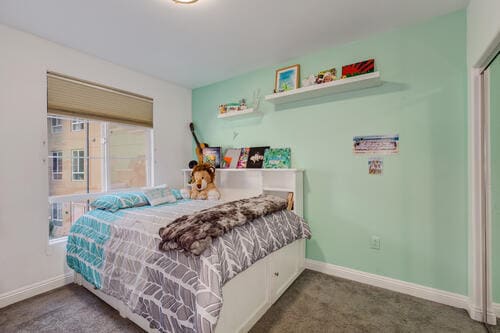 2nd Bedroom with Big Window and Carpet - 5831 Seawalk Dr