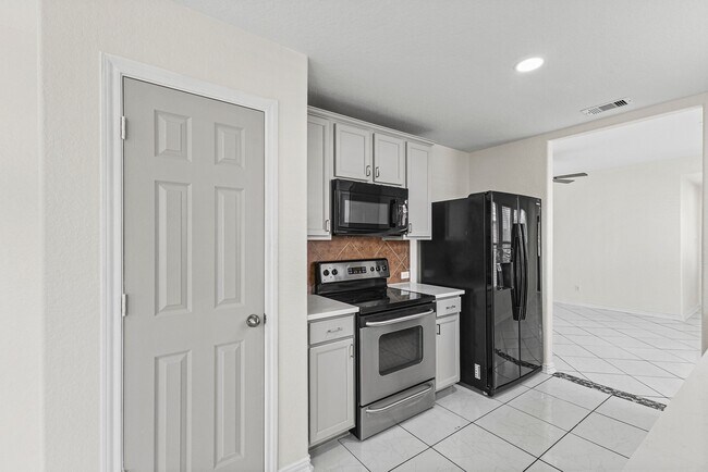 Building Photo - 9006 Wildbird Ln