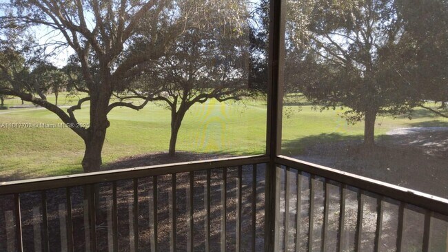 Building Photo - 200 Jacaranda Country Club Dr