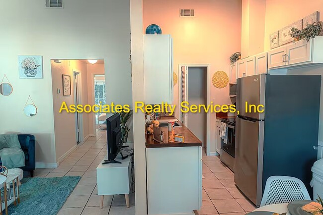 Building Photo - Beautifully furnished  2-Bedroom Duplex – ...