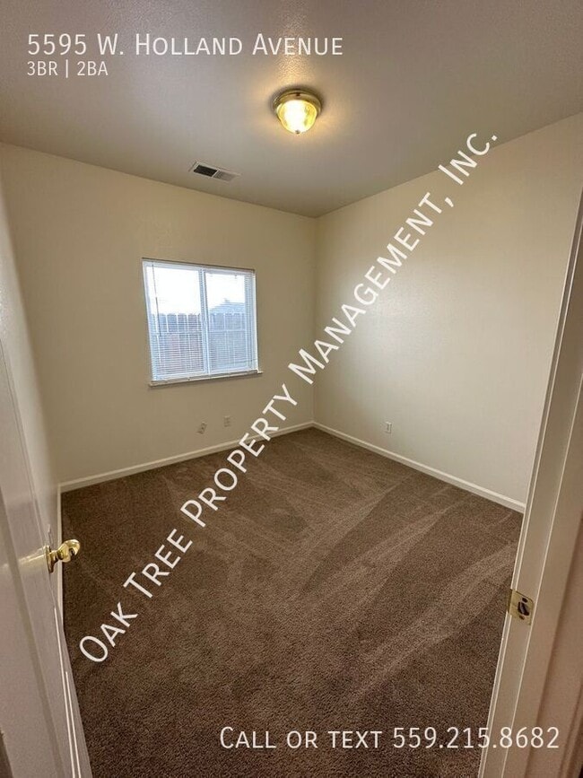 Building Photo - 5595 W Holland Ave