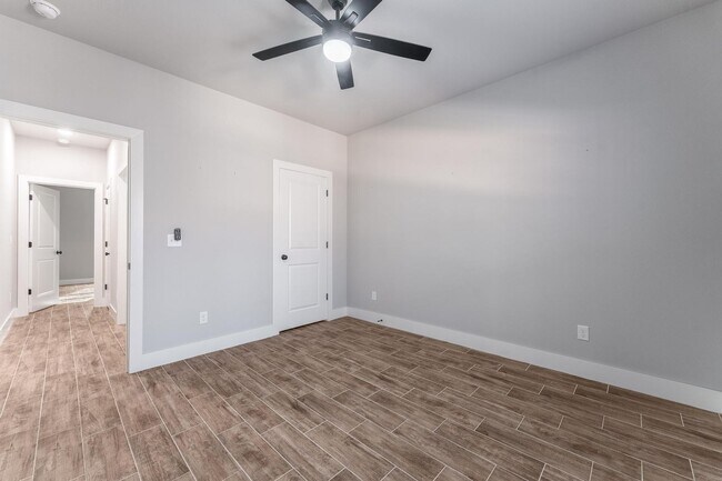 Building Photo - Welcome to this stunning 3-bedroom, 2-bathroom home that boasts a range of high-quality features ...