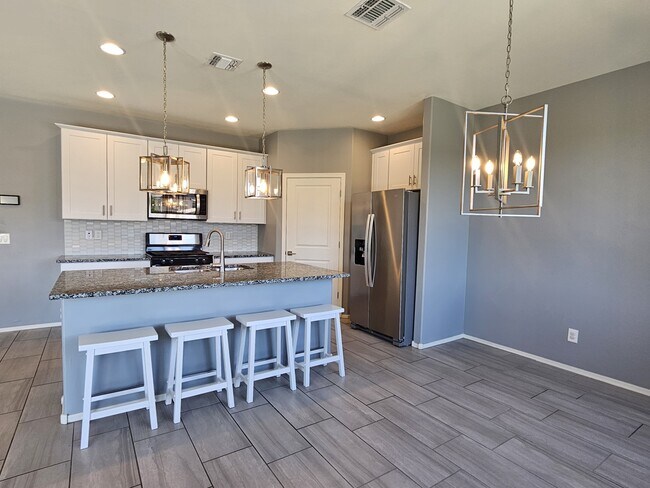 Building Photo - 10679 W Golson Dr
