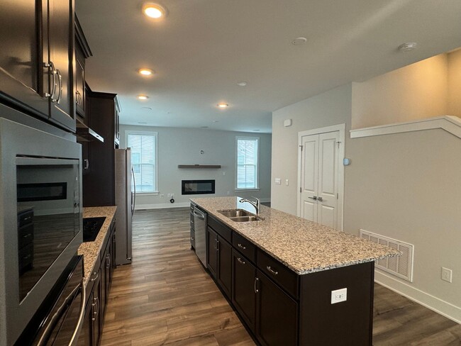 Building Photo - BRAND NEW - 3 Bed | 2.5 Bath End Unit Town...