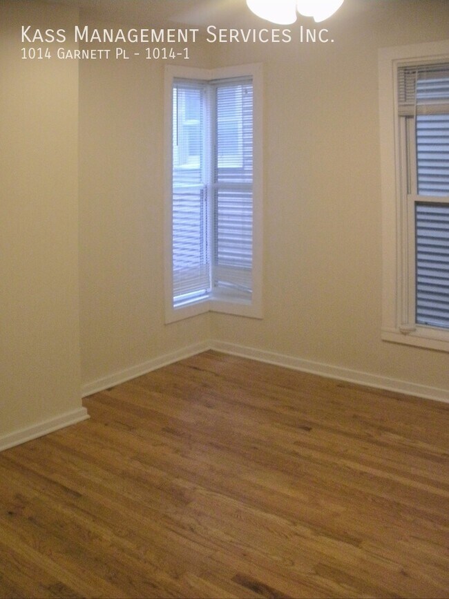 Building Photo - Very Spacious Duplex Apartment features 4 ...