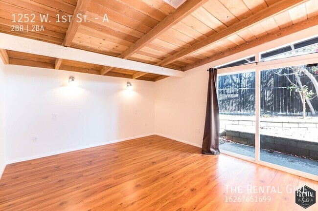 Building Photo - Spectacular 2 Bedroom W/ Exposed Beams & B...