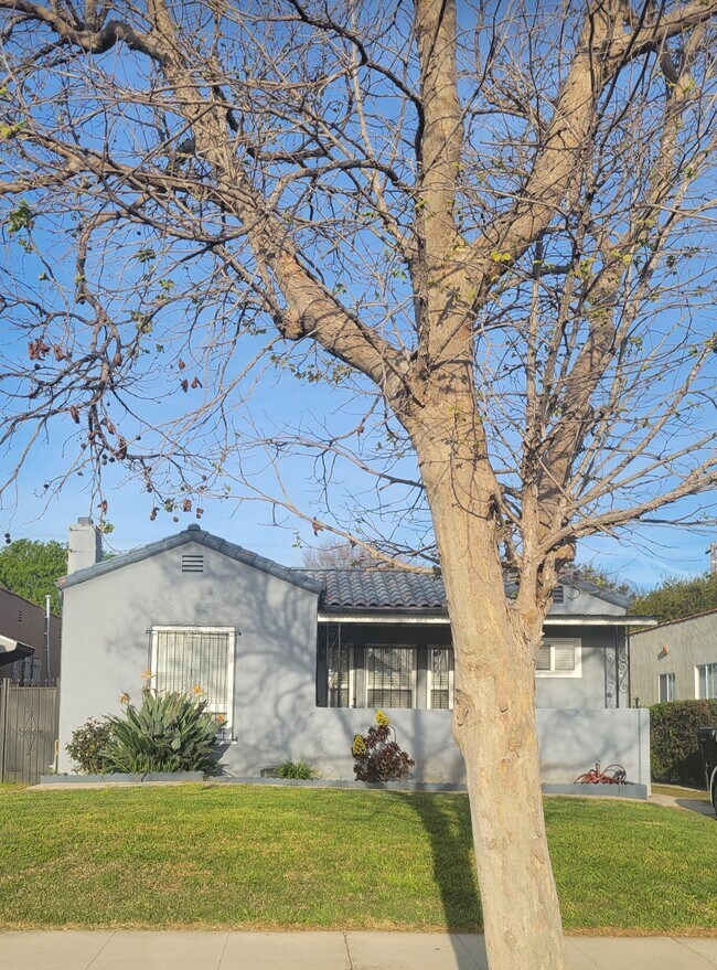 Building Photo - 7823 S Denker Ave