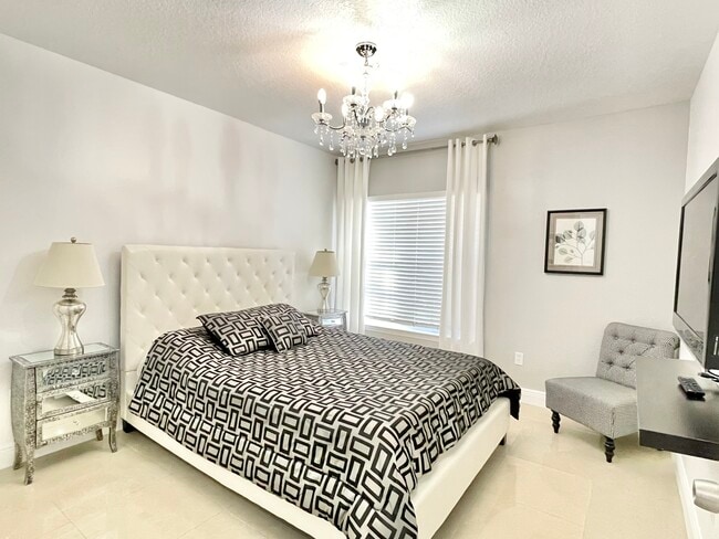 Sophisticated bedroom with tasteful contemporary decor - 7240 Westpointe Blvd