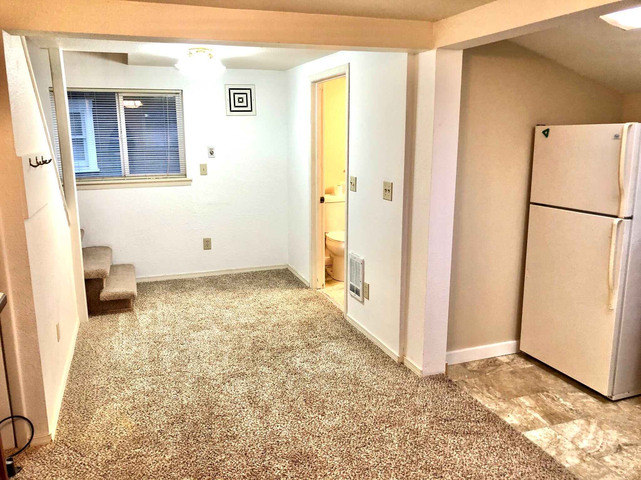 new flooring and paint downstairs - 1007 W Main St