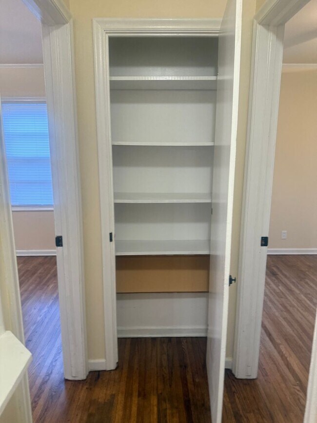 Building Photo - Step into this beautifully updated 1950's gem, where charm meets modern convenience