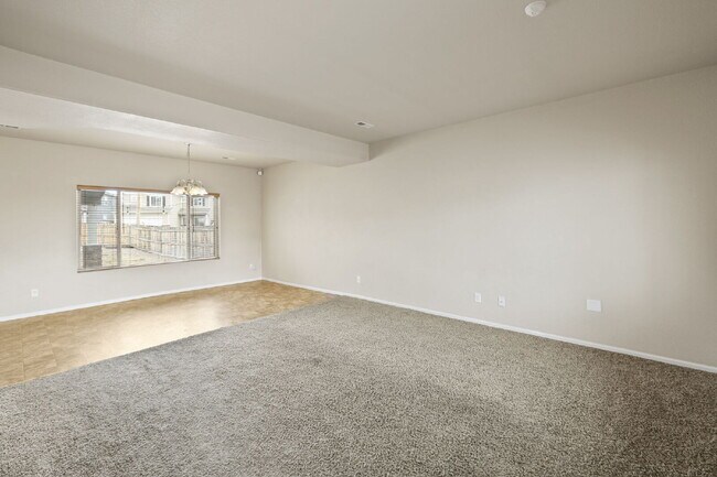 Building Photo - Spacious 4-Bedroom Home with Loft, Solar & Fenced Backyard
