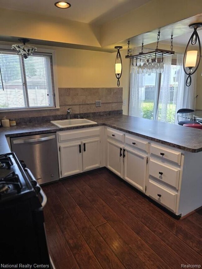 Building Photo - Spacious 4-Bedroom Colonial with Fireplace, Office & Fenced Yard