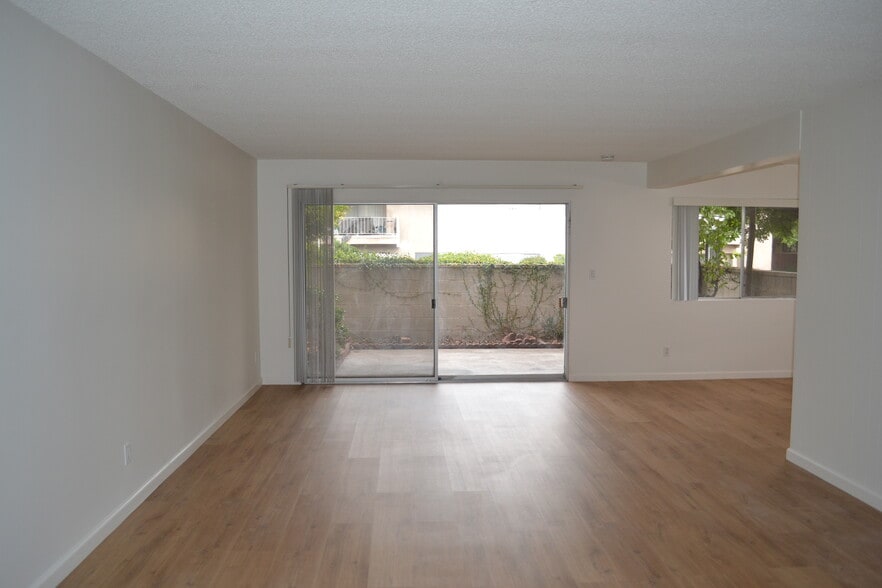 Living Room with Private Yard Outside - The Huntington Sunset