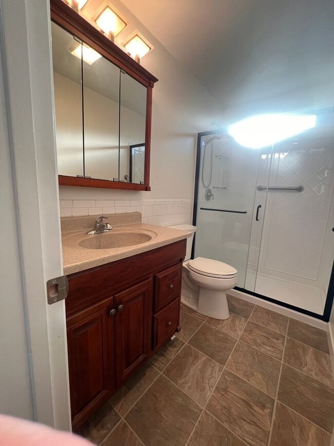 Building Photo - Private Back House with single garage & yard