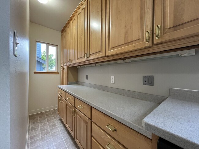 Building Photo - Character-Filled Concordia Home with Flexible Living Spaces & Gas Fireplace