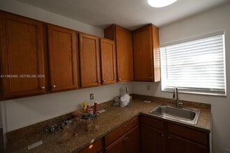 Building Photo - 7130 W 11th Ct