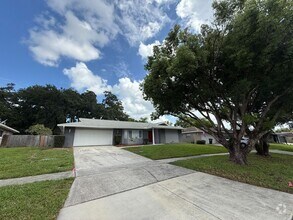 Building Photo - Pretty 3/2 Pool Home in Spring Oaks Commun...