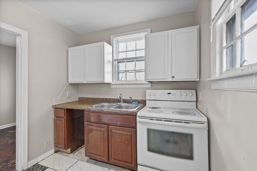 Building Photo - 1227 W 25th St