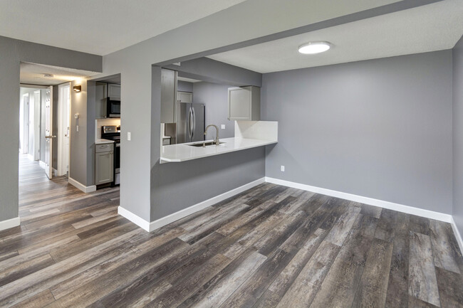 Dining/kitchen and hallway. - 499 Wright St