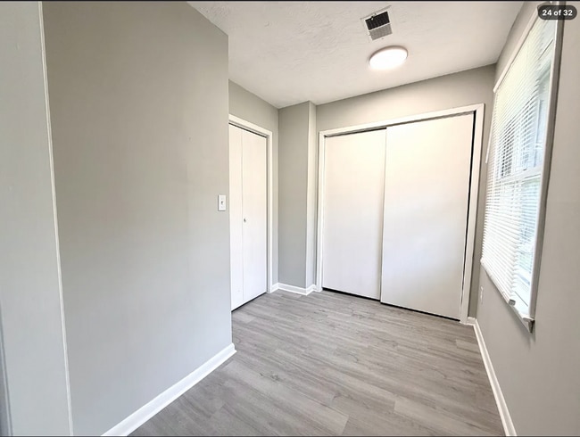 Building Photo - AVAILABLE NOW – FAIRBURN, GA 4 Bedrooms + Flexible Main-Level Living Space | Full Bathroom on Mai...