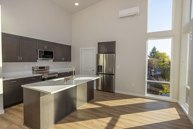 Building Photo - BRAND NEW - Reserve Street Lofts