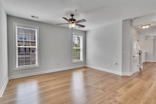 Building Photo - Spacious End Unit with Garage in Gated Com...