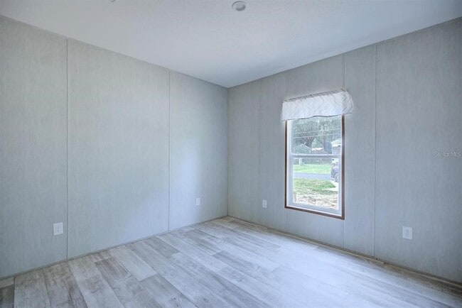 Building Photo - 8595 NW 13th Ct