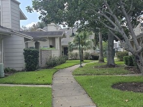 Building Photo - Beautifully Updated 2BR/2BA with Loft Oasis – Safe & Gated Community