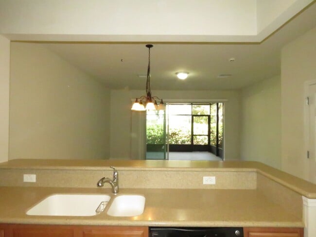 Building Photo - Spacious 3/2.5/1 Townhouse, Lawn Service, Garbage and Water Included