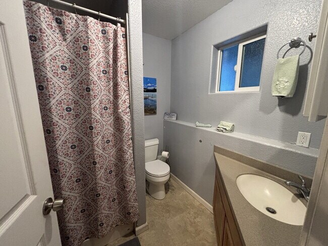 Building Photo - Rare 4-bedroom 3-bath home with studio apartment conveniently located off Starkes Grade Road! Opt...