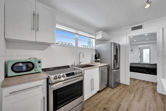 Building Photo - 9072 Froude Ave