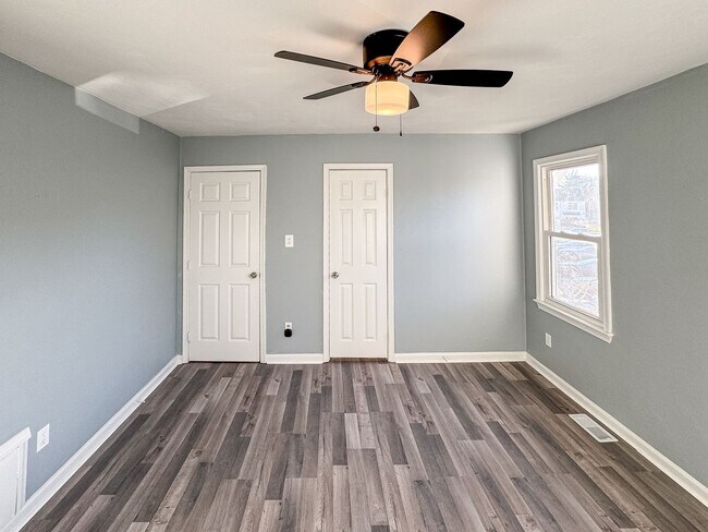 Building Photo - Introducing our spacious townhouse located...