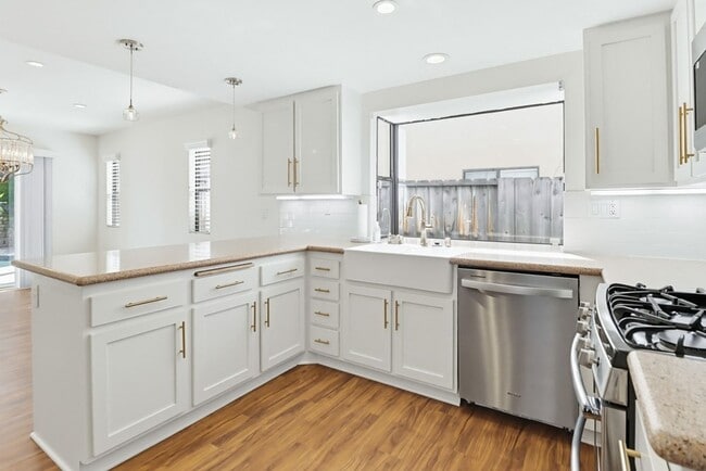 Building Photo - Stunning Upgraded 4BR Home with Pool in Desirable Rancho San Diego – Move-In Ready