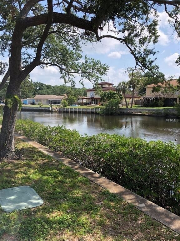 Building Photo - Beautiful water view ground floor condo in...