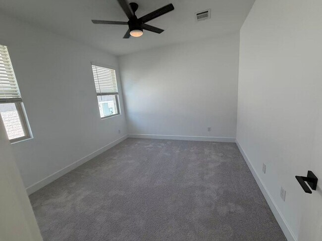 Building Photo - Move-in ready and like-new! Washer, dryer, and refrigerator Included.