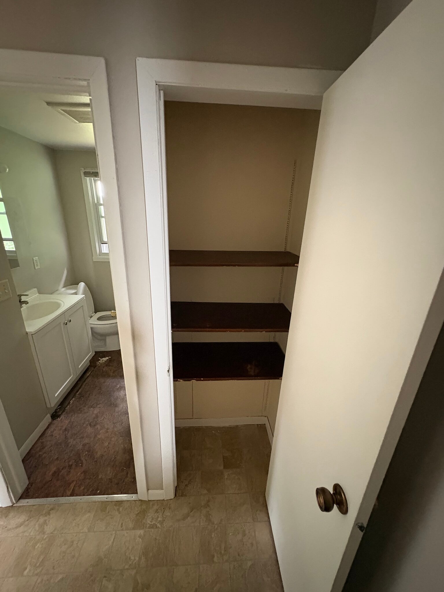 Bathroom linen closet. - 1511 S Point Rd