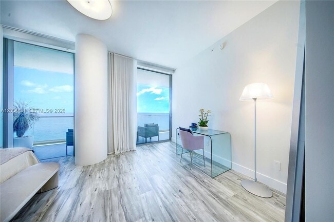 Building Photo - 10203 Collins Ave